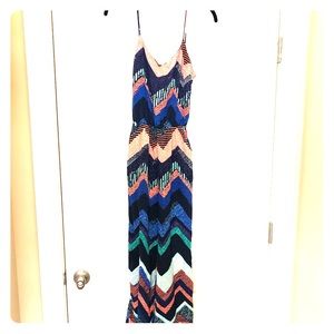 Multi-colored romper with open back and tie